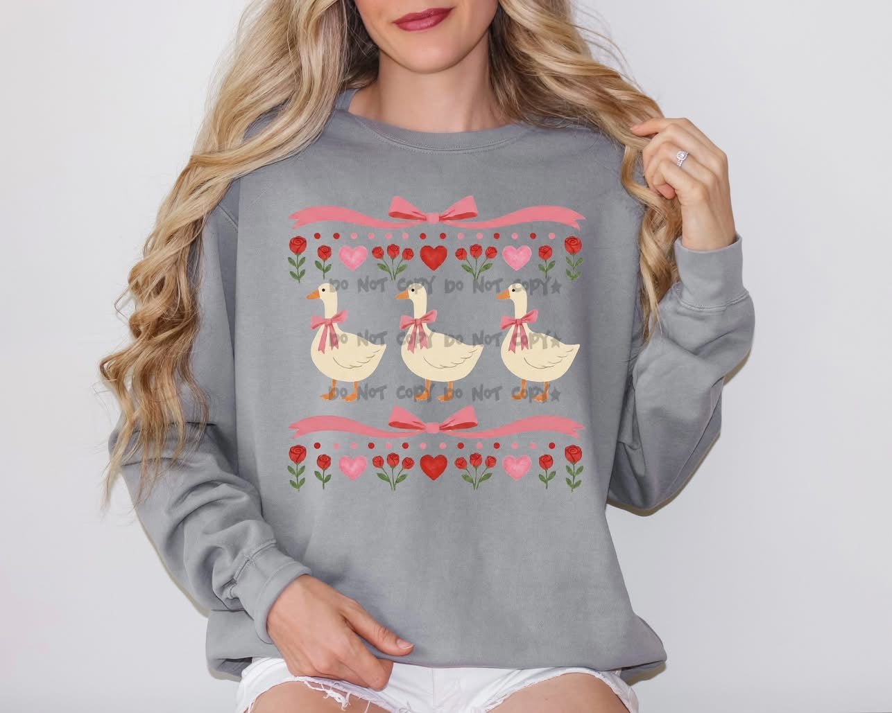 geese with hearts and bowsT-Shirt