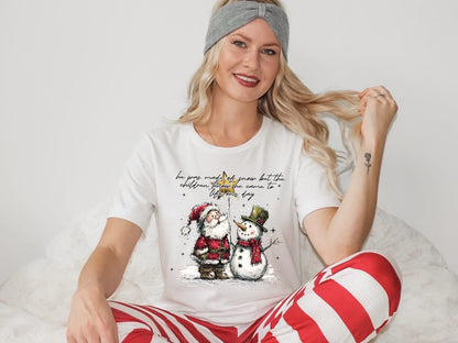 He was made of snow but the children know he came to life one dayT-Shirt